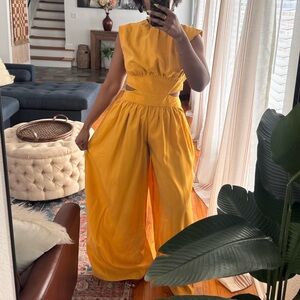 ASOS yellow jumpsuit with cutouts